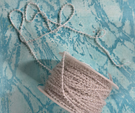 CORD WITH PEARL SEED BEADS PER YARD
