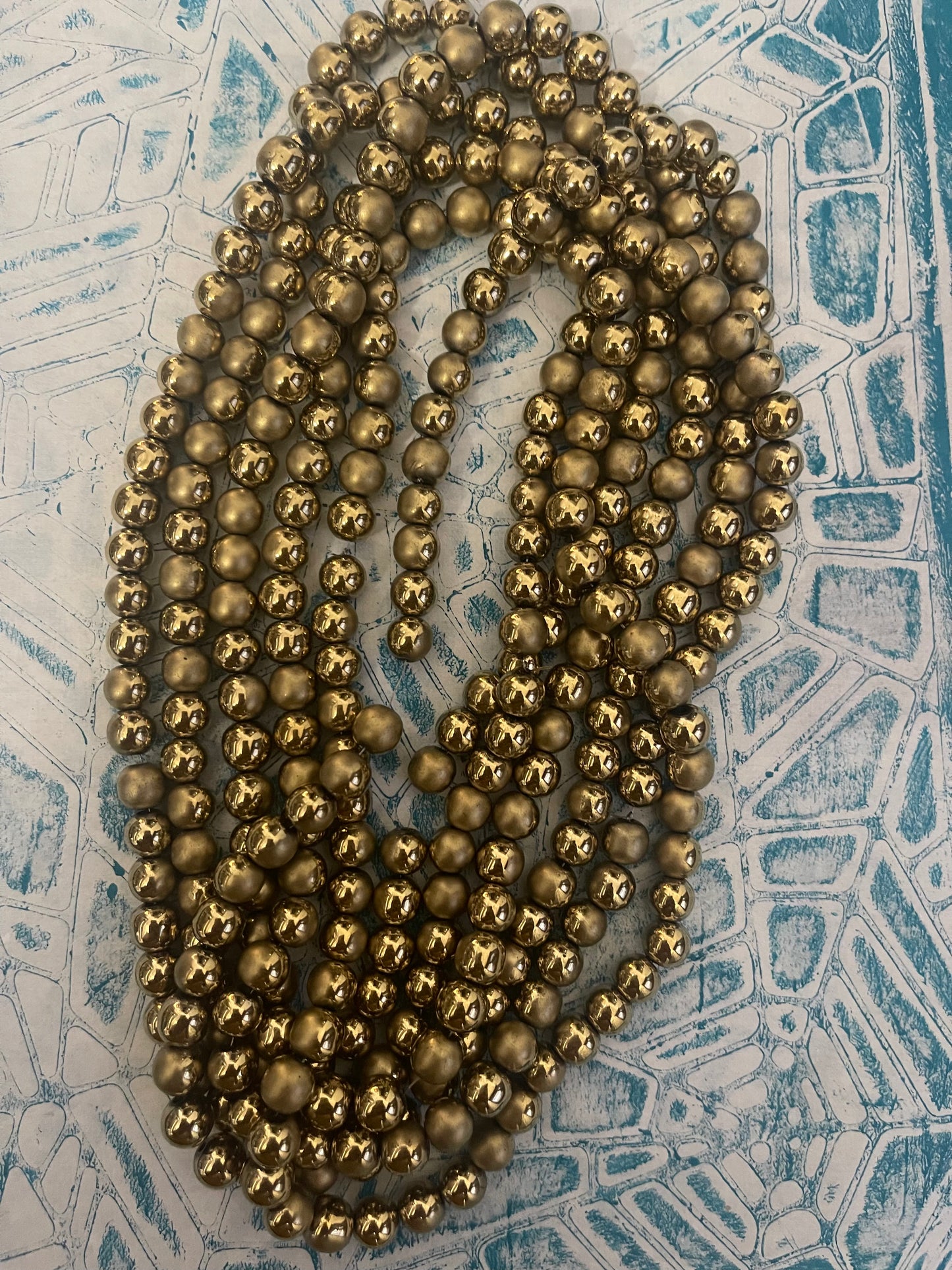 HEMATITE 8MM ROUND MATTE GOLD 1 STRAND