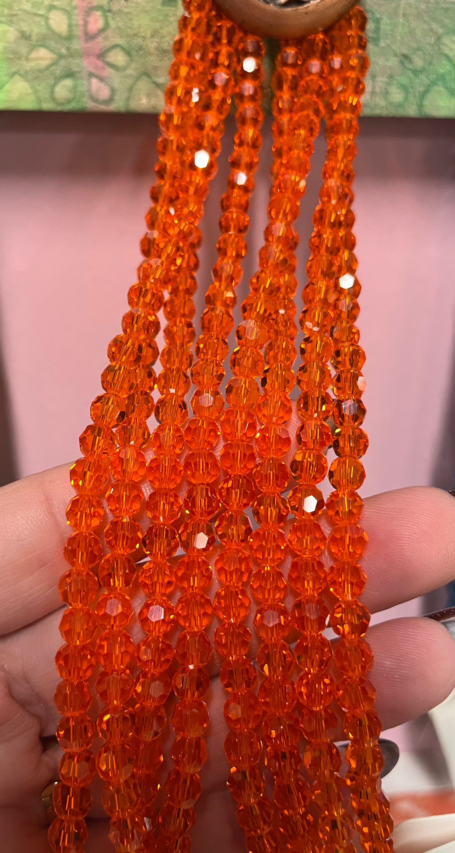 GLASS 6MM ROUND ORANGE RED 1 STRAND