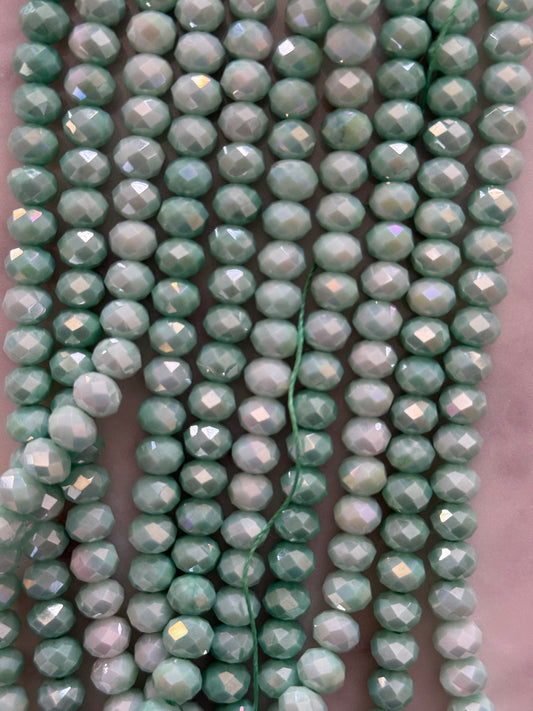 GLASS RONDELLE 8X6MM AQUAMARINE 1 STRAND