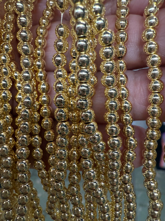 HEMATITE 4MM ROUND LIGHT GOLD PLATED 1 STRAND