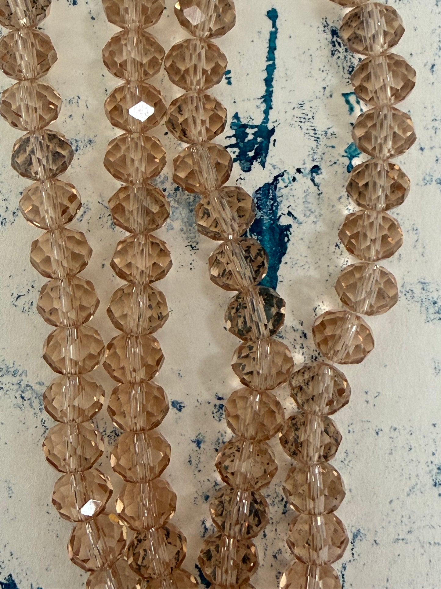 GLASS RONDELLE 8MM CHAMPAGNE CLEAR 1 STRAND