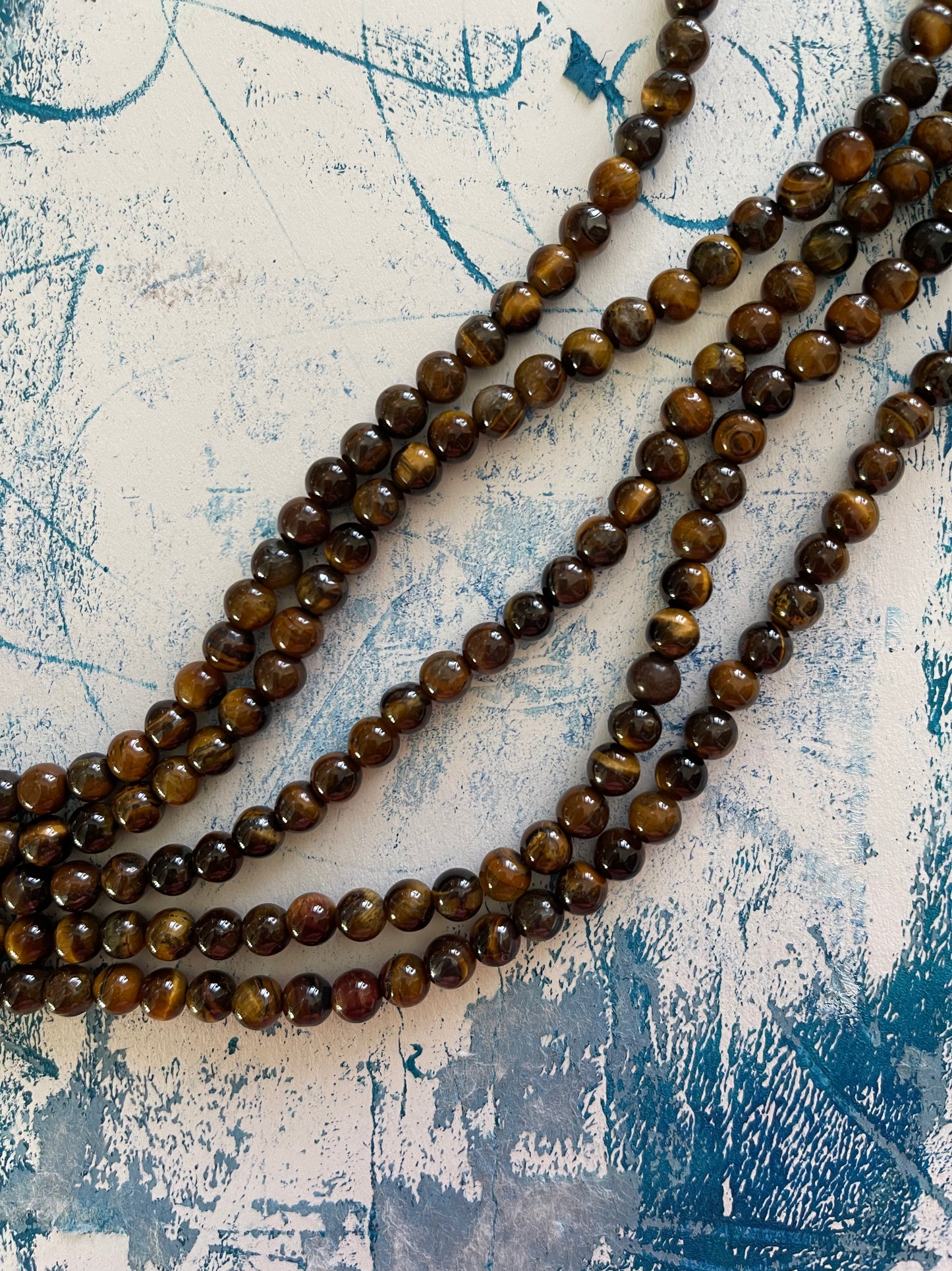 TIGER EYE 6MM ROUND 15.5 INCHES 1 STRAND