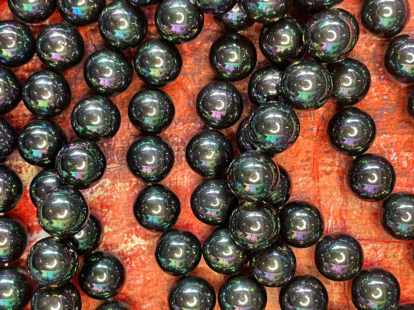 BLACK PEARL SHELL ROUND 12 MM 1 STRAND ABOUT 34 PC