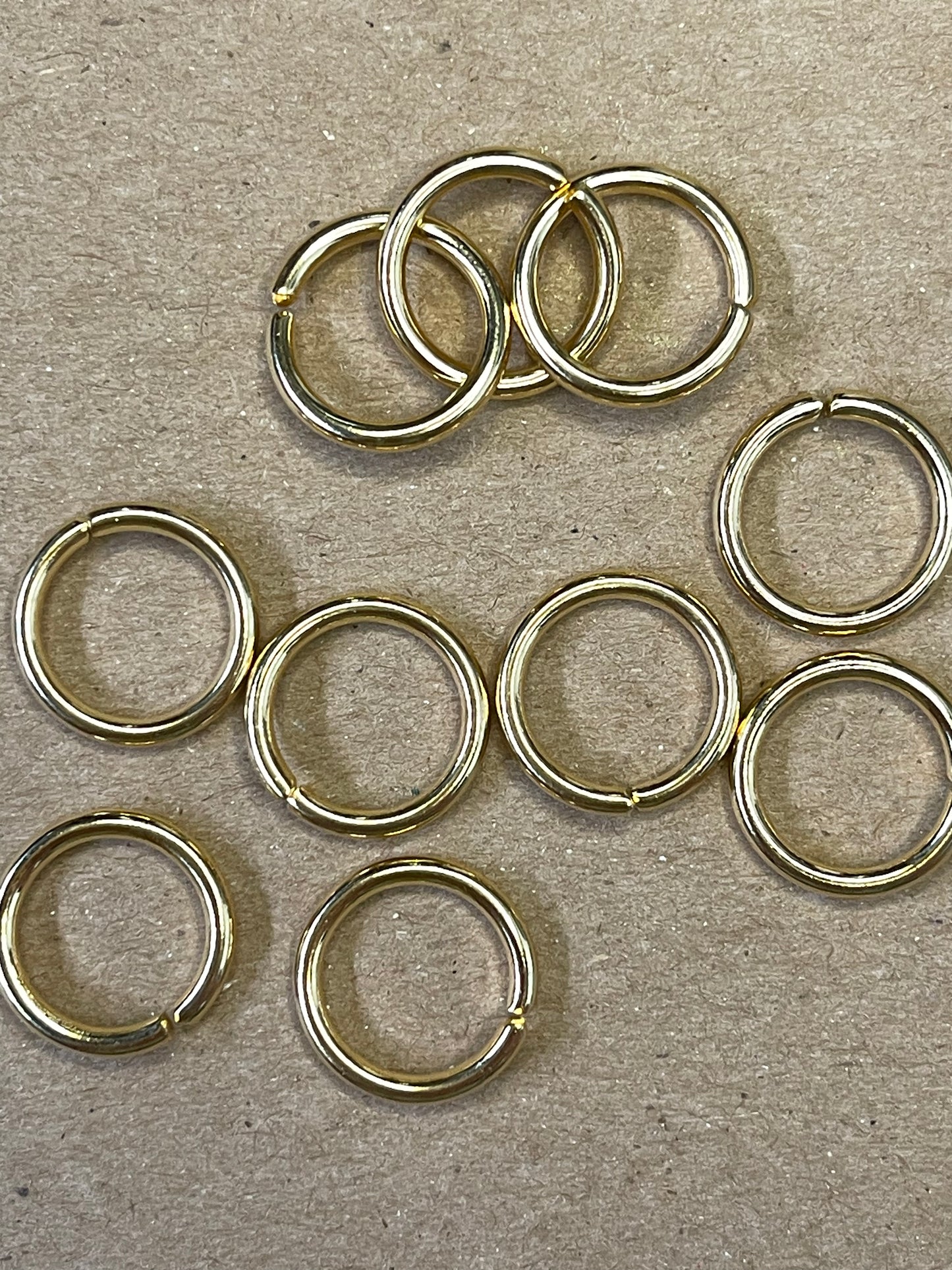 JUMPRING 15MM STAINLESS STEEL GOLD PLATE 24 KT 10 PC