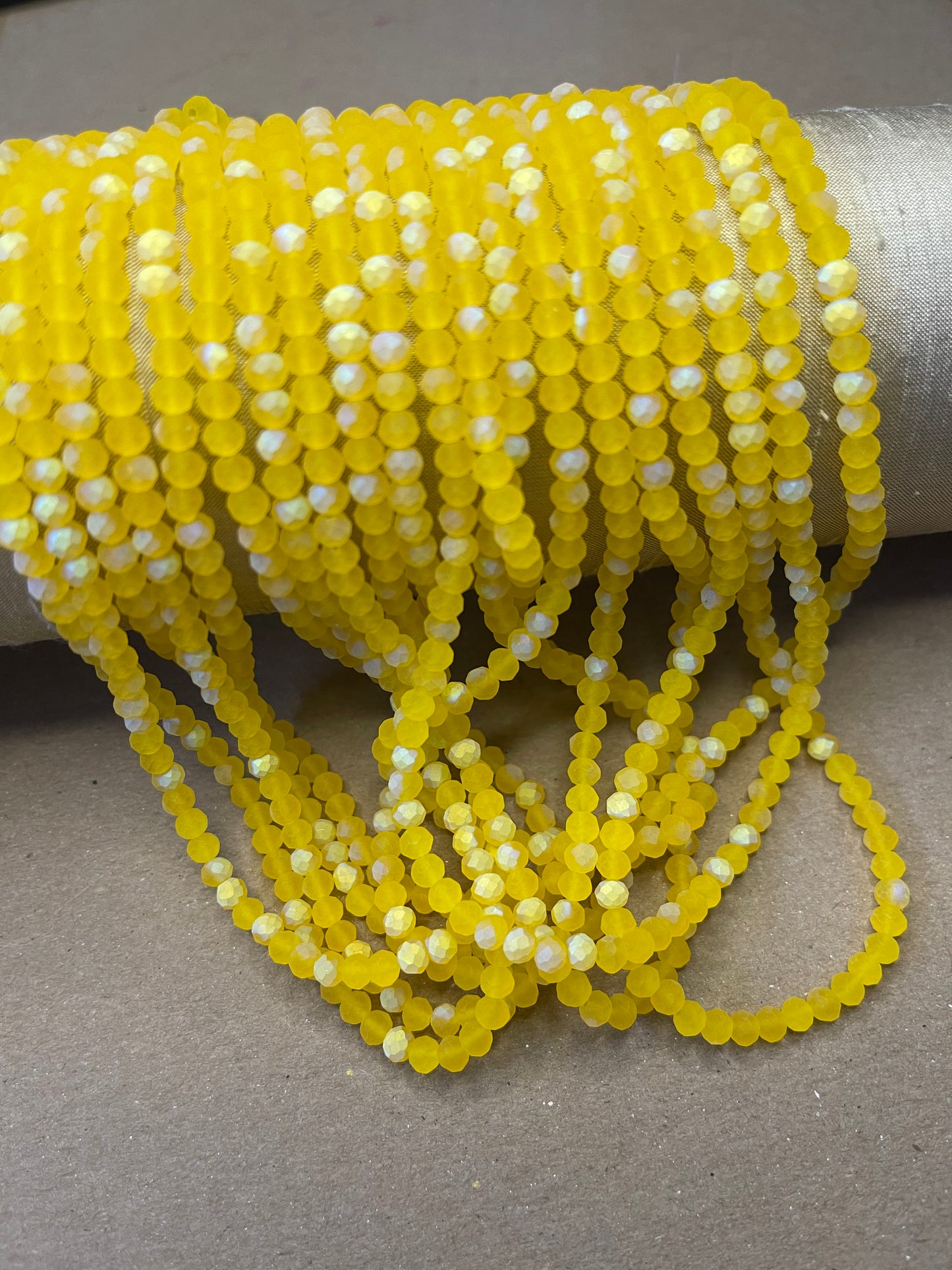 GLASS RONDELLE 4MM HALF AB FACETED AND FROSTED 1 STRAND  117 PCS