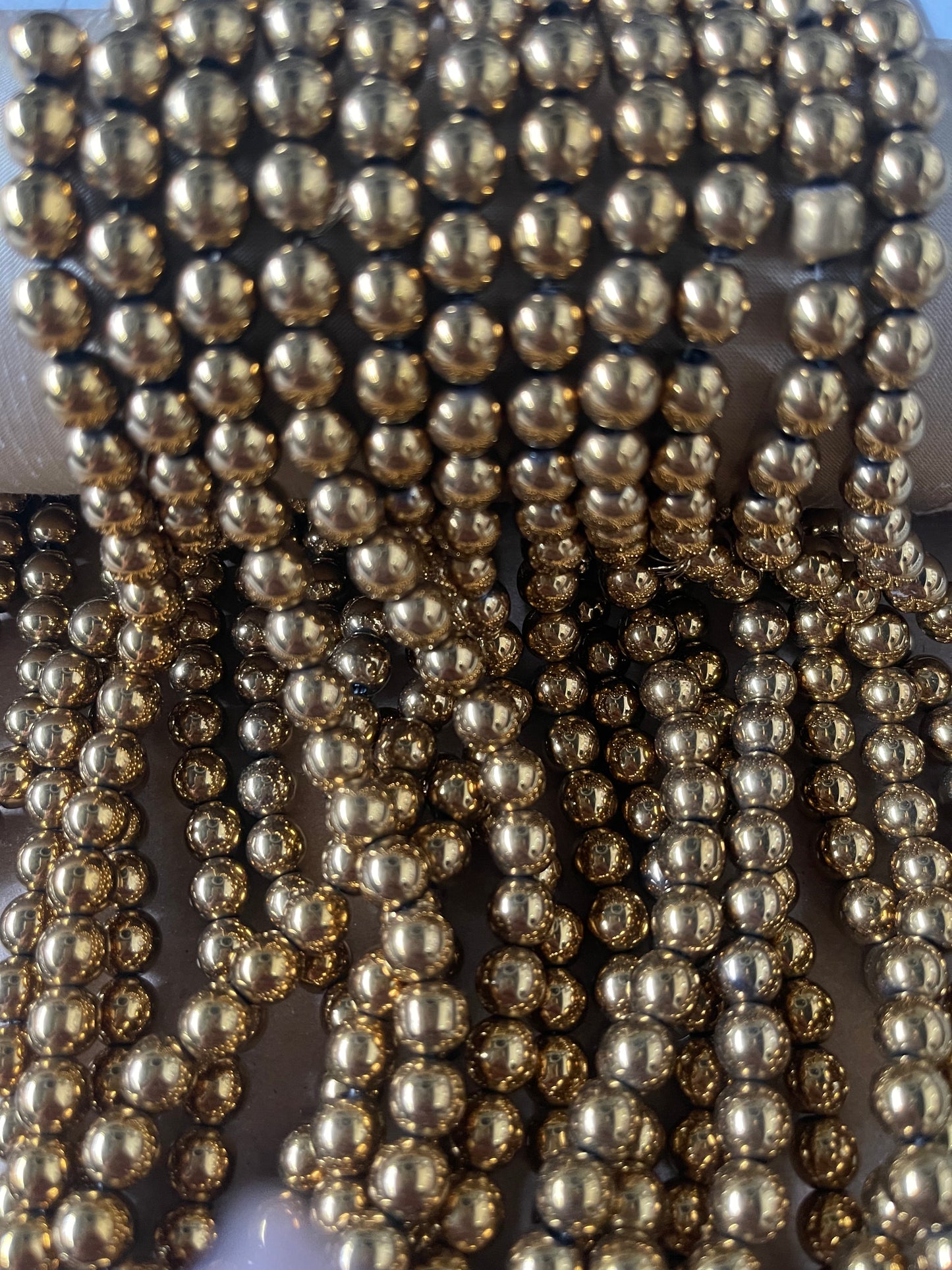 HEMATITE 8MM ROUND GOLD PLATE 50 PC PER 1 STRAND