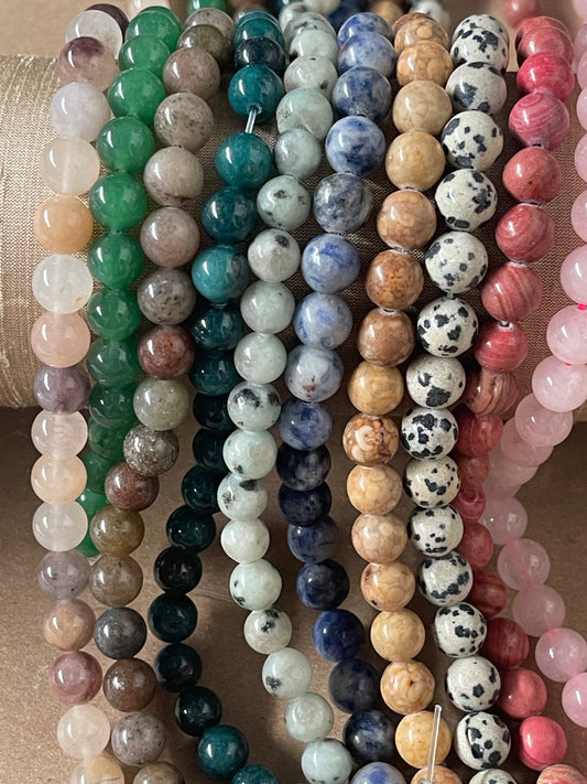 GEMSTONE MIX 8MM ROUND 49 PC PER 1  STRAND