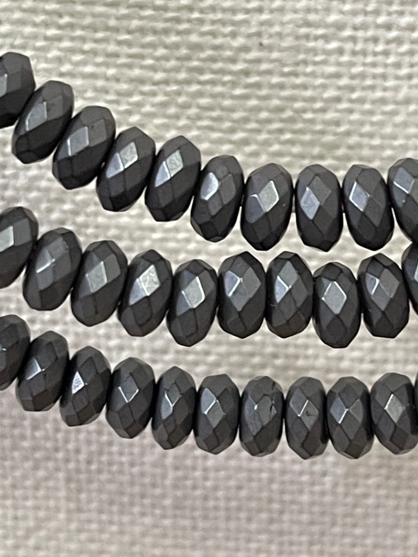 HEMATITE 5.5MM RONDELLE FROSTED 140 PC PER 1 STRAND