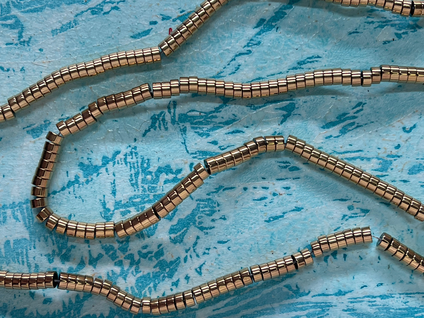 HEMATITE HEISHI DISC 4X2MM 1 STRAND