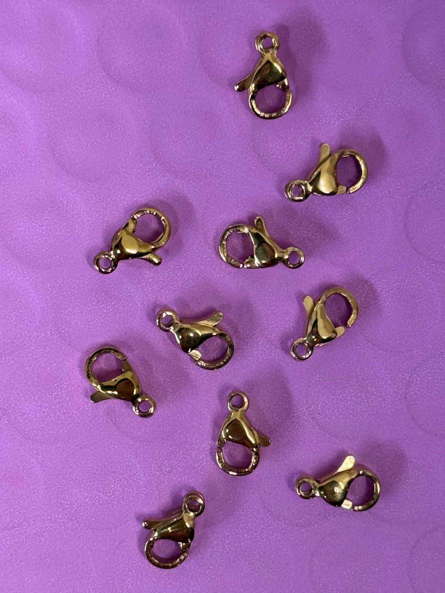 LOBSTER 9X6MM STAINLESS STEEL GP 18KT  10 PC