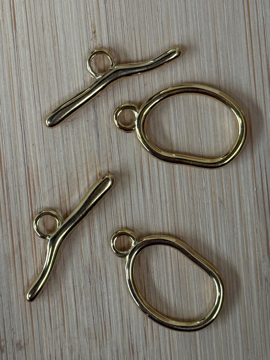 TOGGLE CLASP OVAL 25X15MM STAINLESS STEEL GOLD PLATED 18 KT 2 SETS