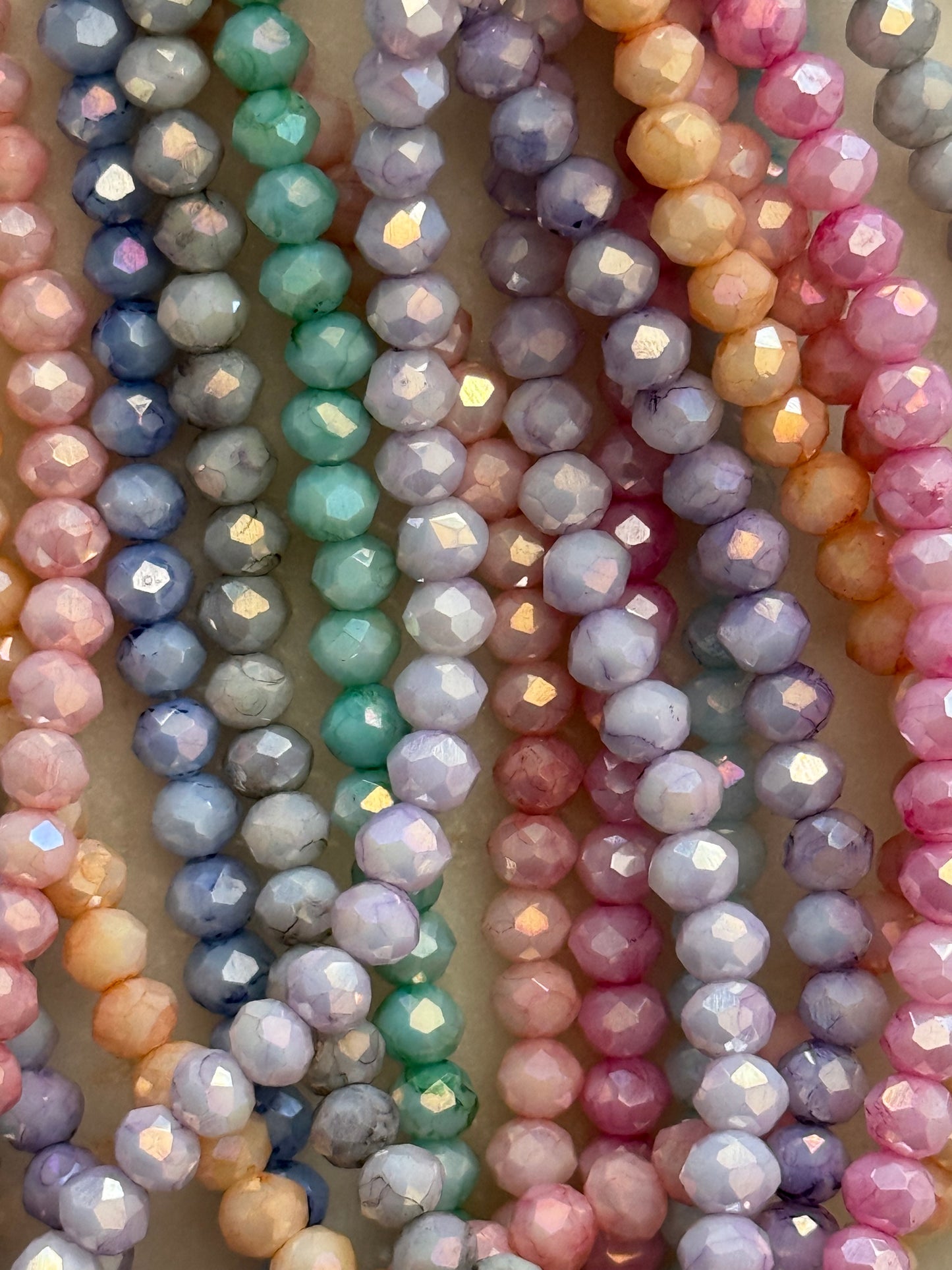 GLASS RONDELLE 4X3MM OPAQUE PASTEL ELECTROPLATE 1 STRAND