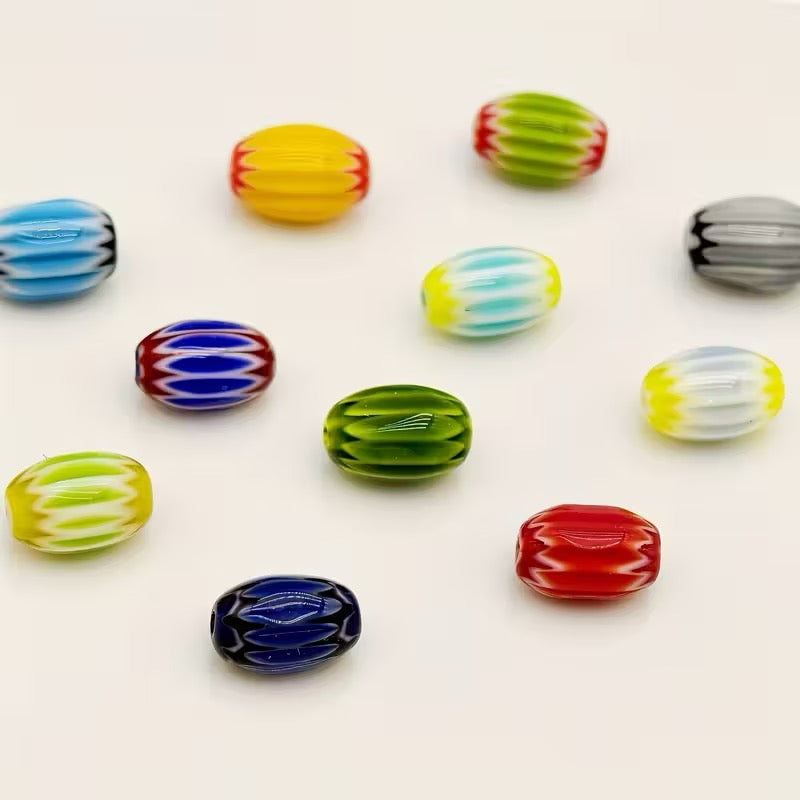 GLASS RICE BEAD STRIPED FROM NEPAL 5X9MM 10 PV