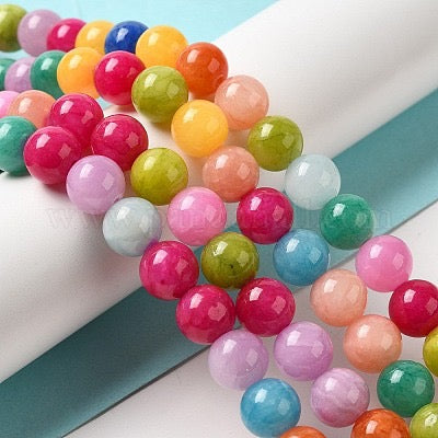 YELLOW JADE 10MM ROUND NIXED COLORS ABOUT 38 BEADS PER 1 STRAND