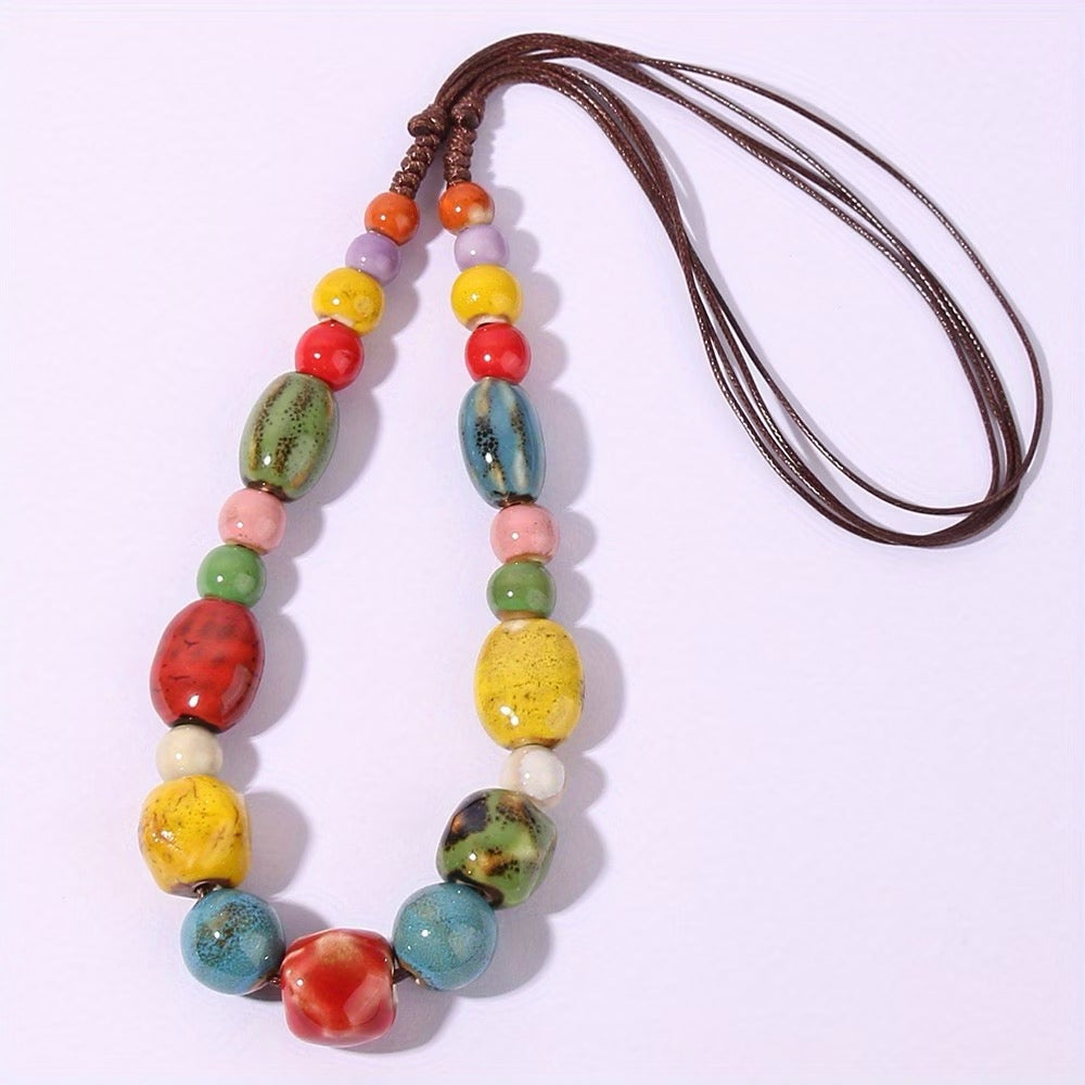 NECKLACE CERAMIC LARGE COLORFUL BEADS BROWN KNOTTED CORD