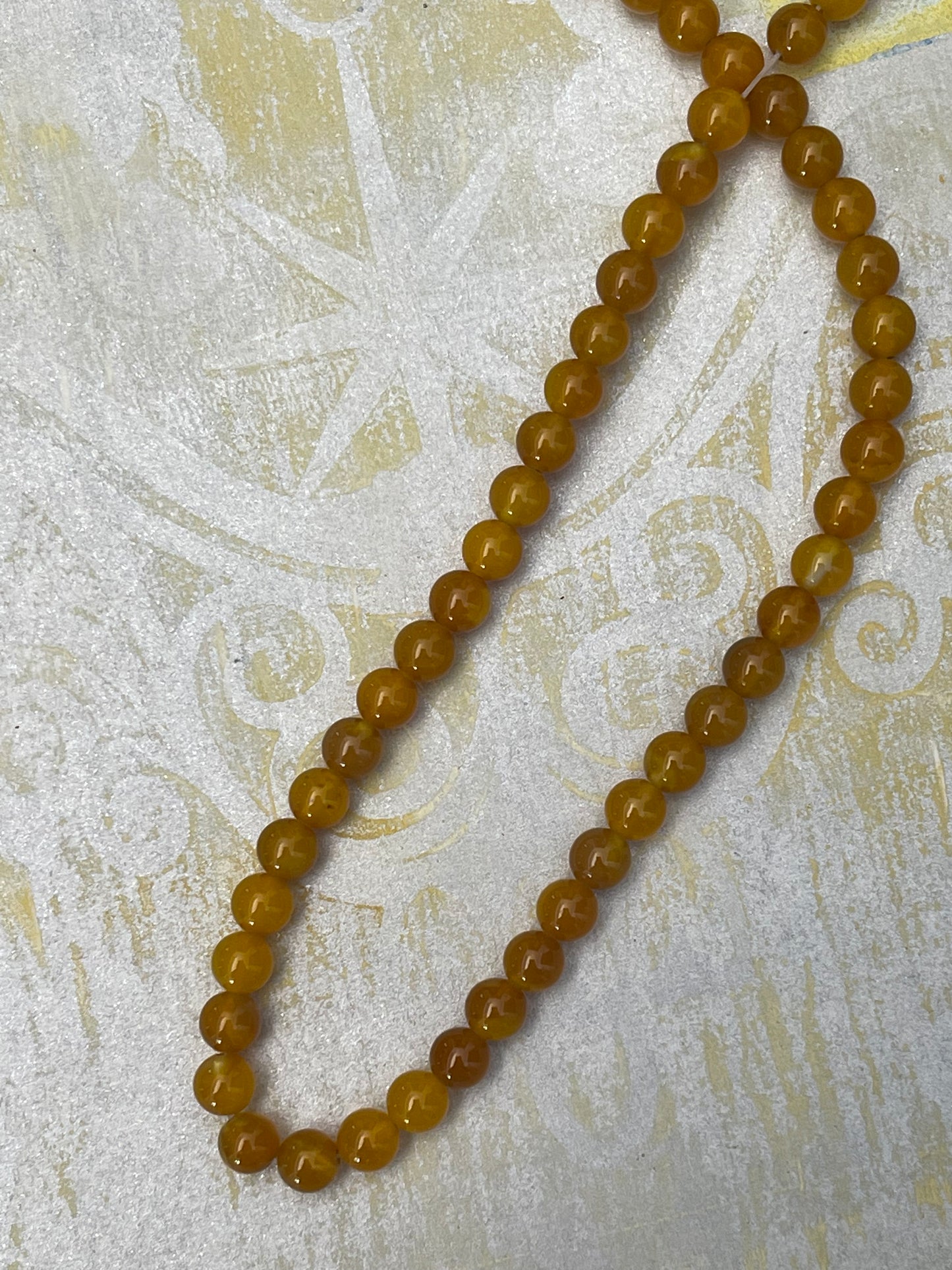 AGATE 6MM ROUND YELLOW 1 STRAND