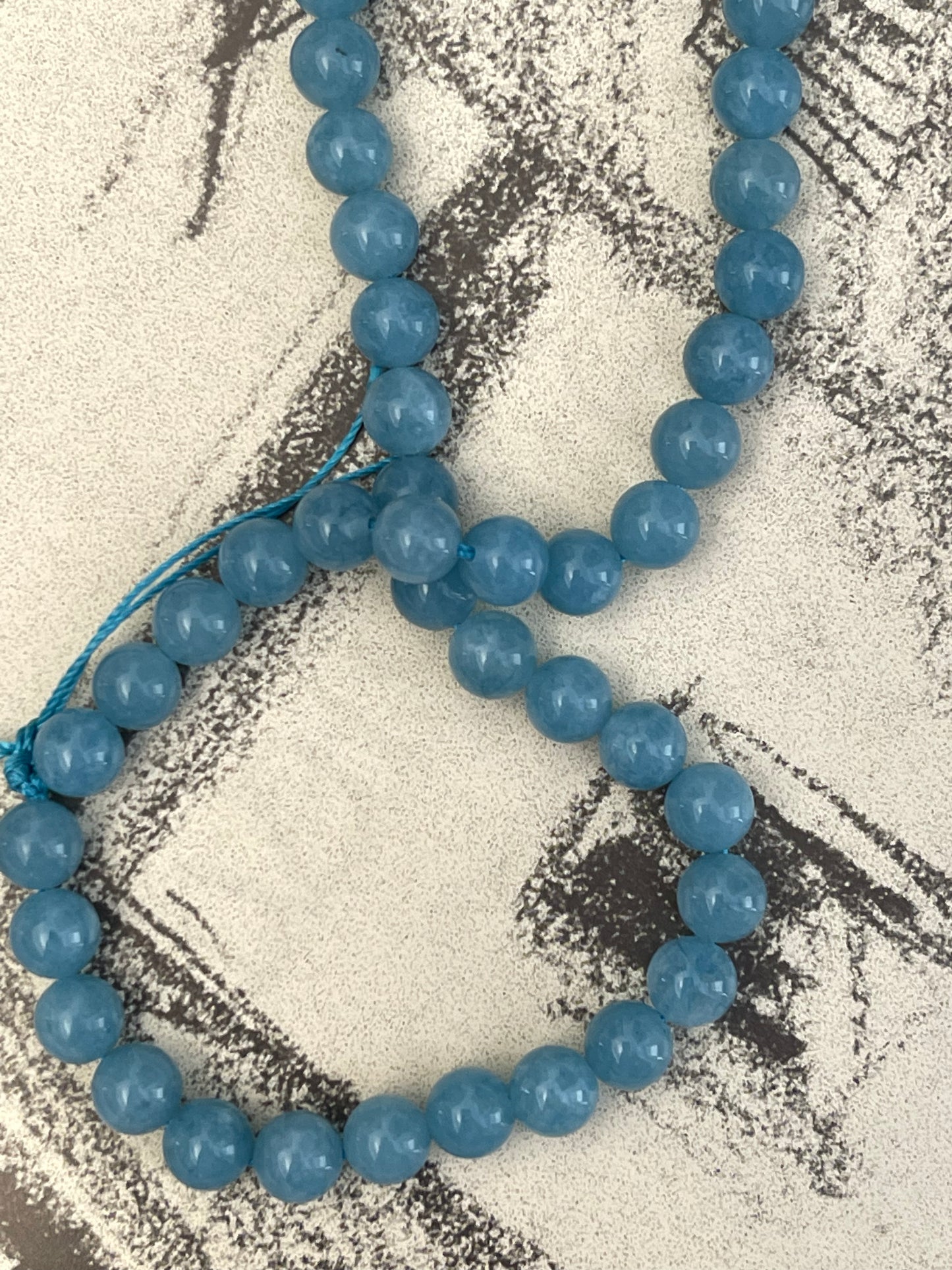 JADE 8MM ROUND AQUAMARINE BLUE 1 STRAND