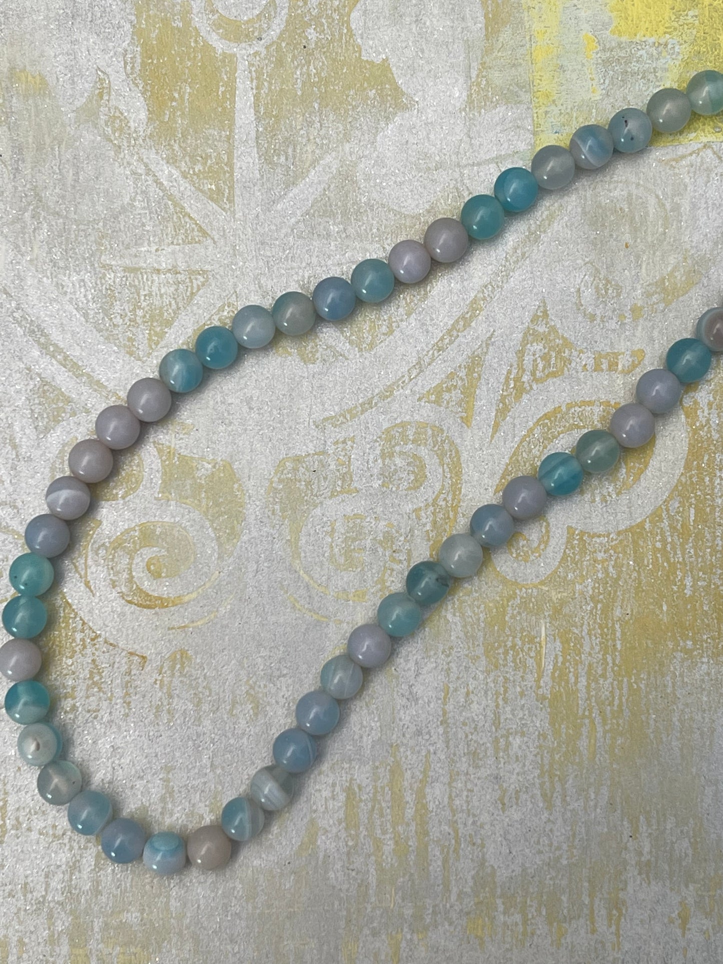 AGATE 6MM ROUND AQUA 1 STRAND