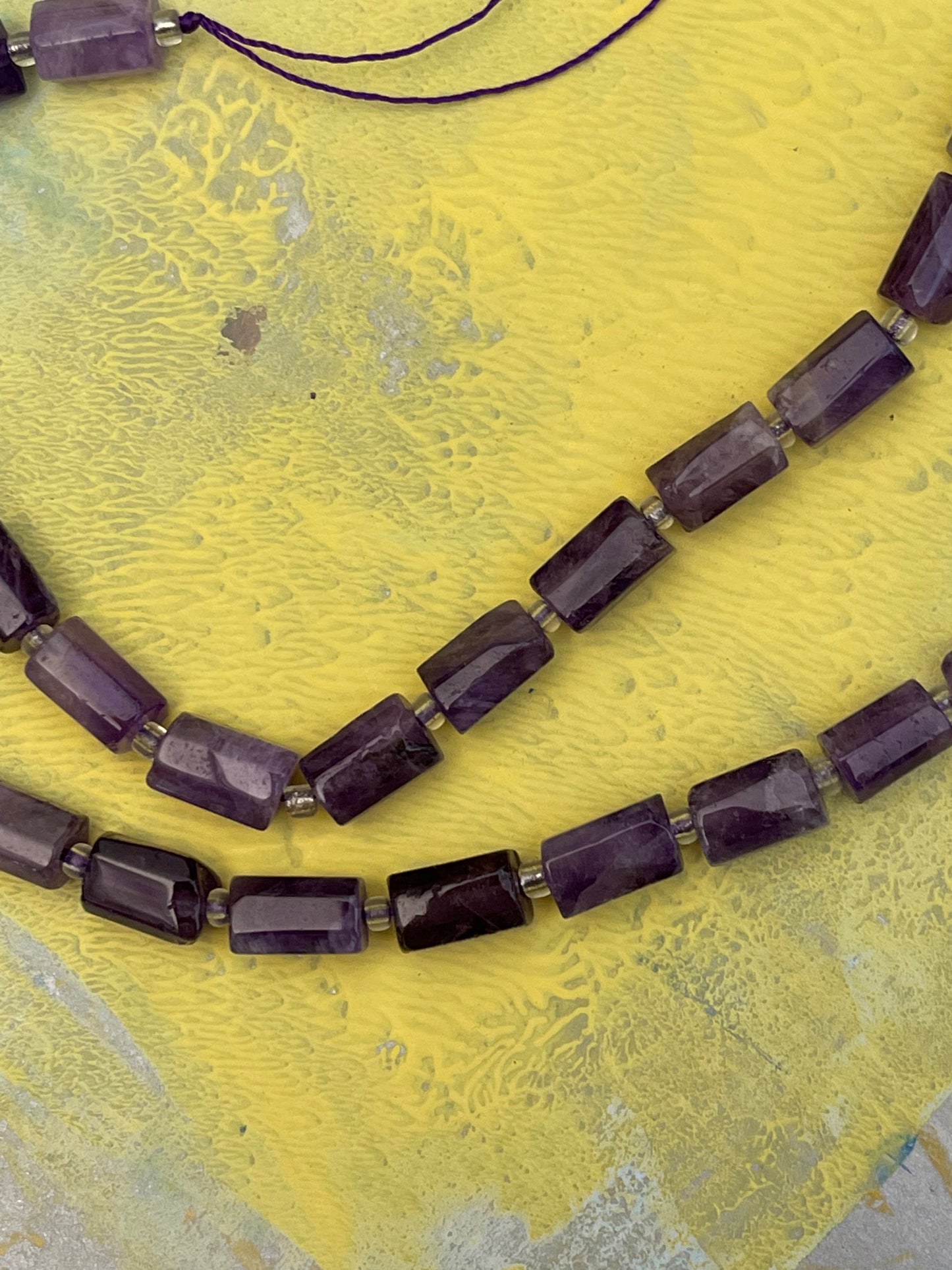 AMETHYST COLUMN 8-11MM 1 STRAND 16 BEADS