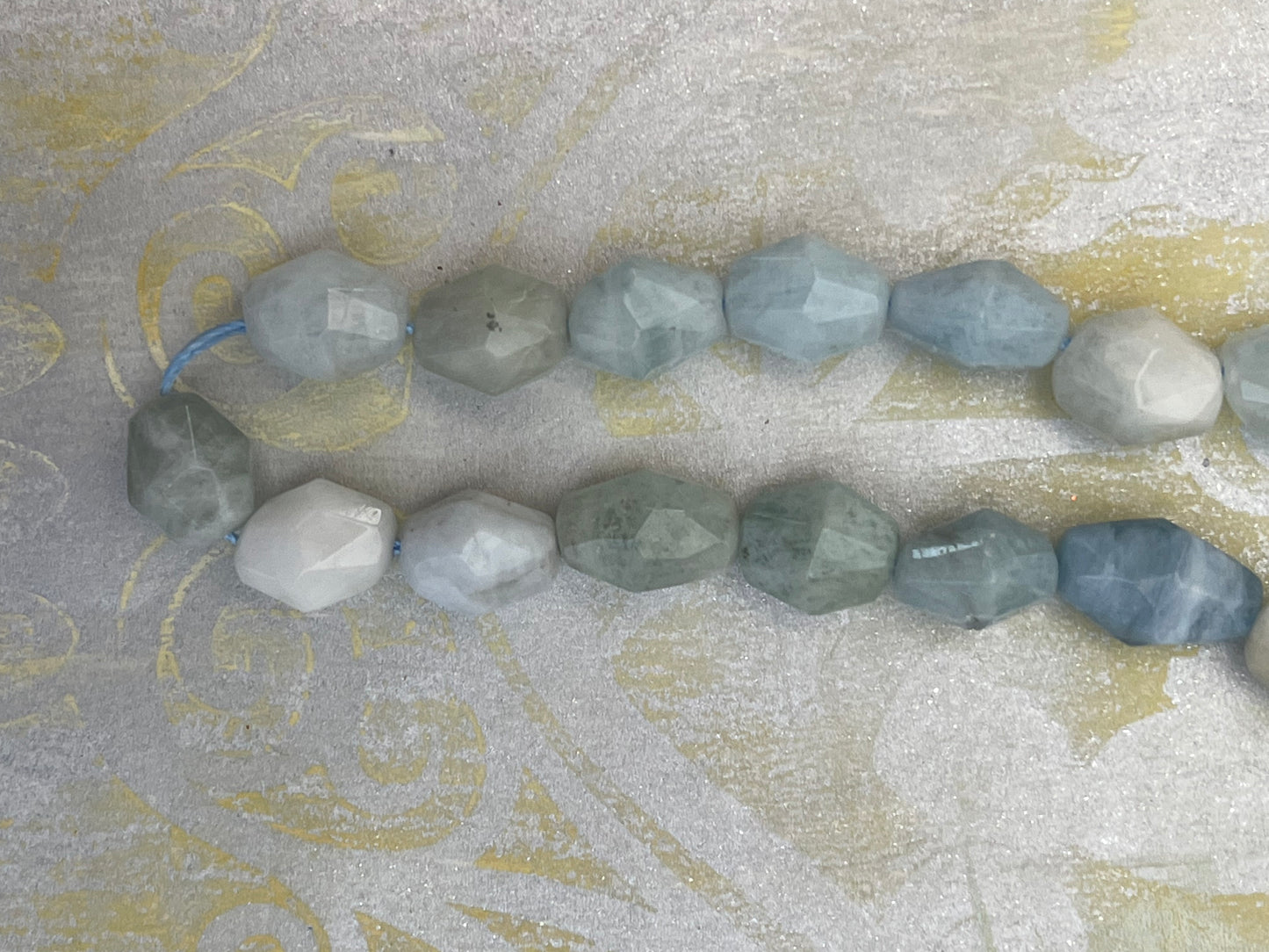 AQUAMARINE 9MM FACETED BARREL 1STRAND